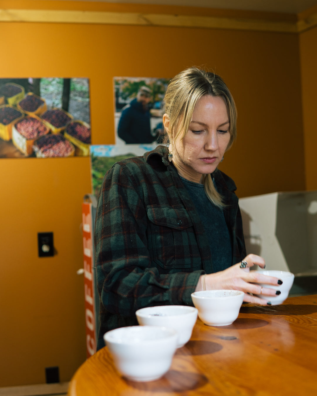 Cupping coffee to create the perfect roast profile.